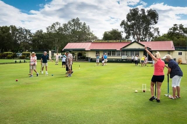 Graceville Croquet Club hosts twilight sausage sizzle