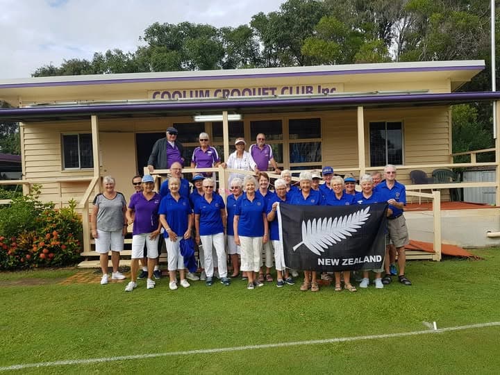 Christchurch croquet visitors play on in the rain at Coolum