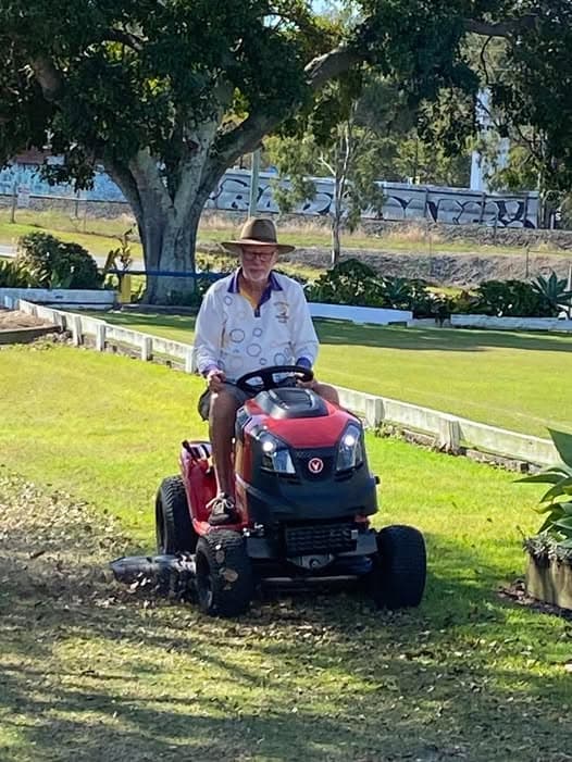 President John lends a hand with parking area trim