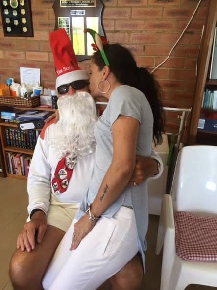 Santa and his elf visit Southport Croquet Club's Christmas party