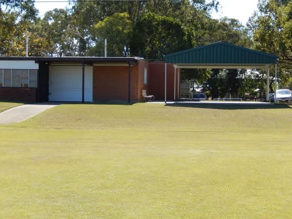 Covered shade area beside clubhouse complete