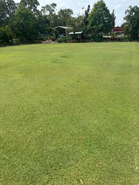 John and club member scarifying the courts