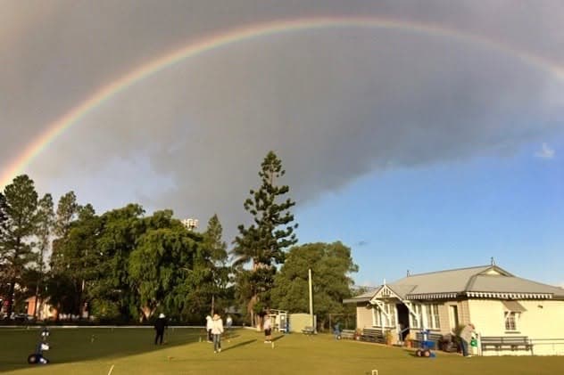 A rainbow over the club distracts Golf Croquet players