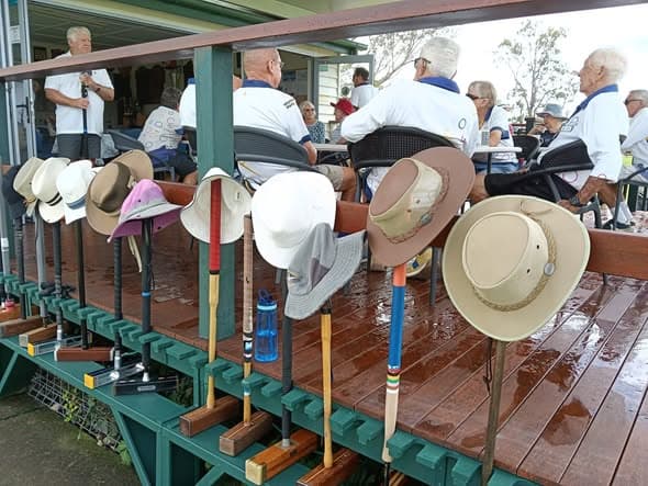 Morning tea at Wynnum: hats on mallets