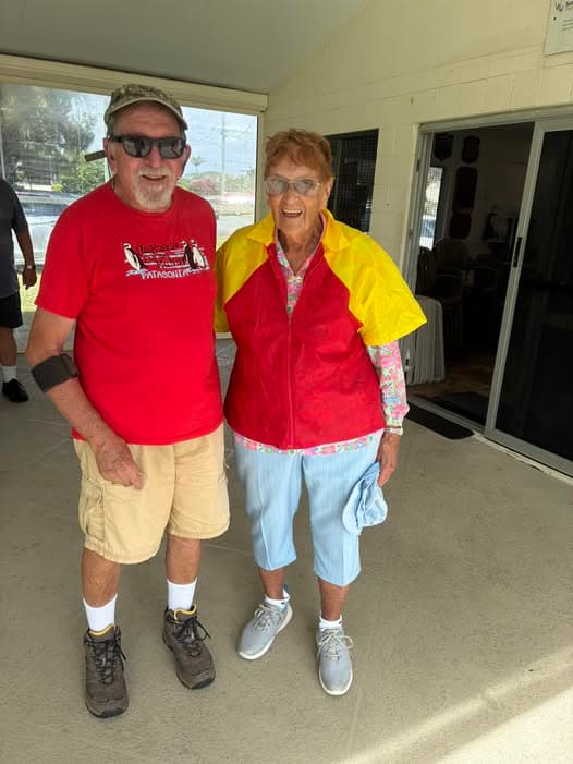 Shirley's Raincoat and Ron's Colourful Partner