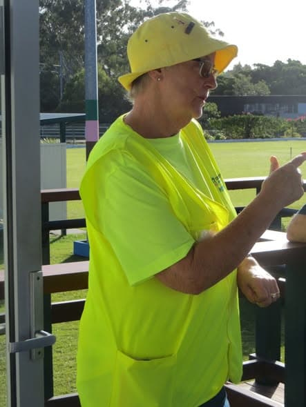 Tournament referee Deirdre guides players at Wynnum, plus 10 more from Wynnum