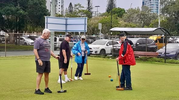 Potential croquet stars brave the weather at Coolangatta, plus one more from Coolangatta